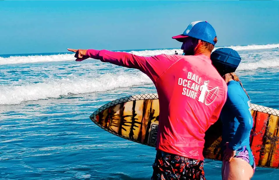 The instructor gives personalized instructions to a Surf Club member