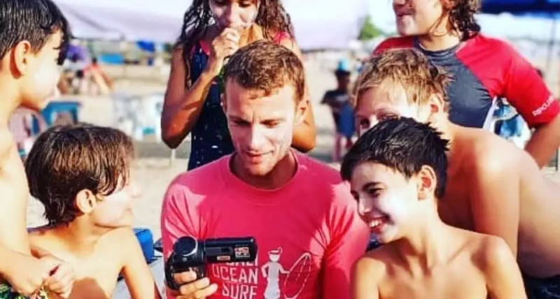 Instructor gives video feedback to Surf Club students