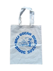 White cotton tote bag Bali Ocean Surf with blue logo "Since 2013", white background, front view